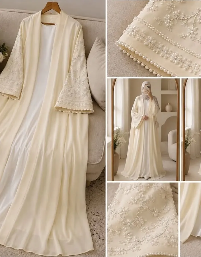 Abaya cream dengan detail bordir mutiara di lengan